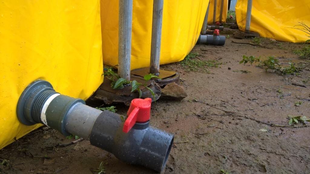 Plumbing for installation and construction of mobile fish pond tarpaulin. From the body of the tarpaulin is the bulkhead, male pvc adapter, pvc pipe, and ball gauge for waste water control.